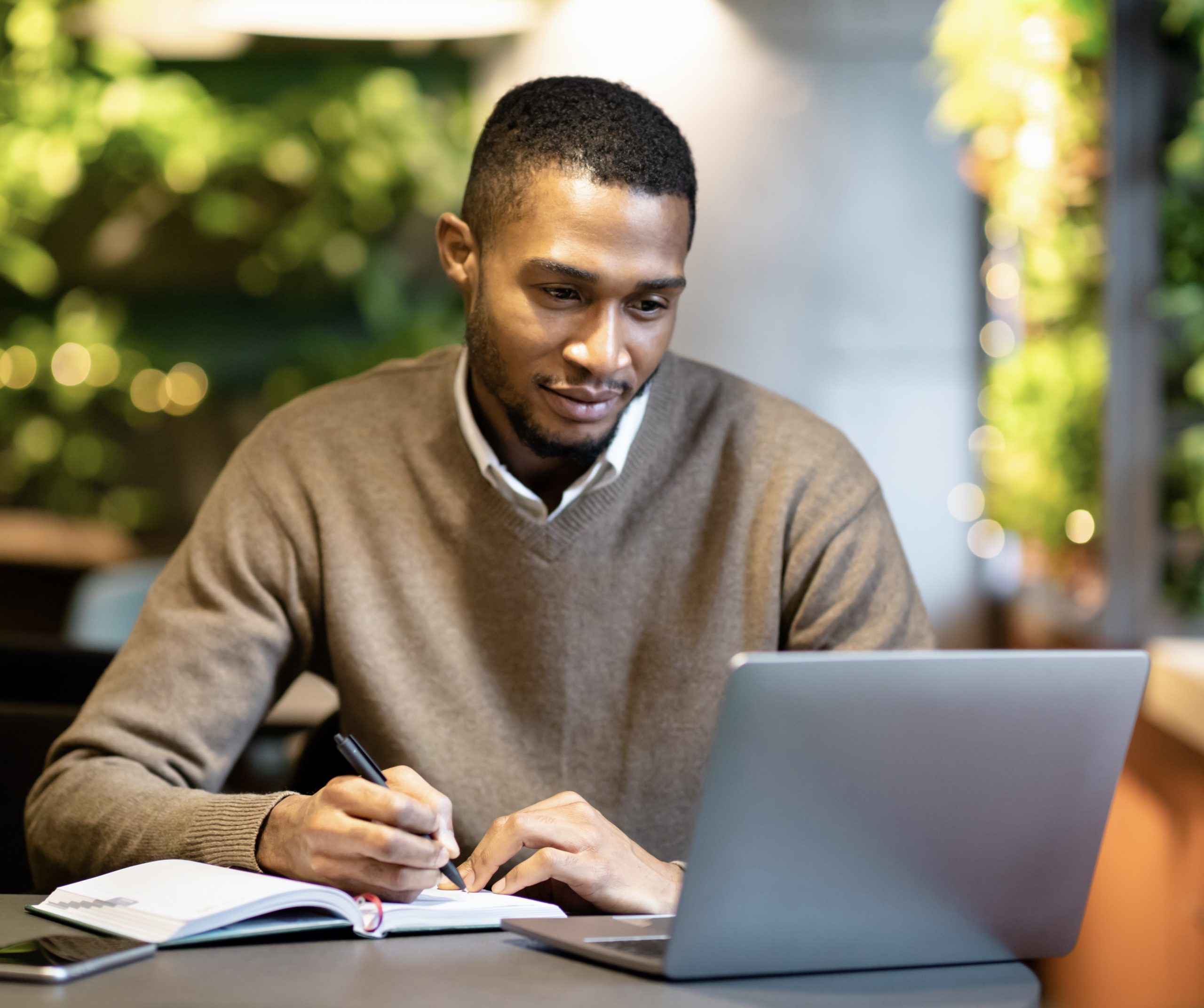 young man copy writer in friendly office environment