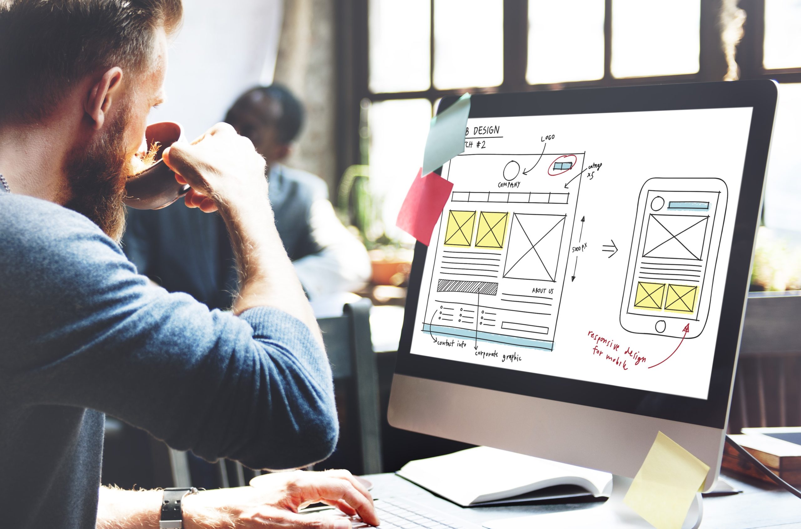 man designing website help with web design
