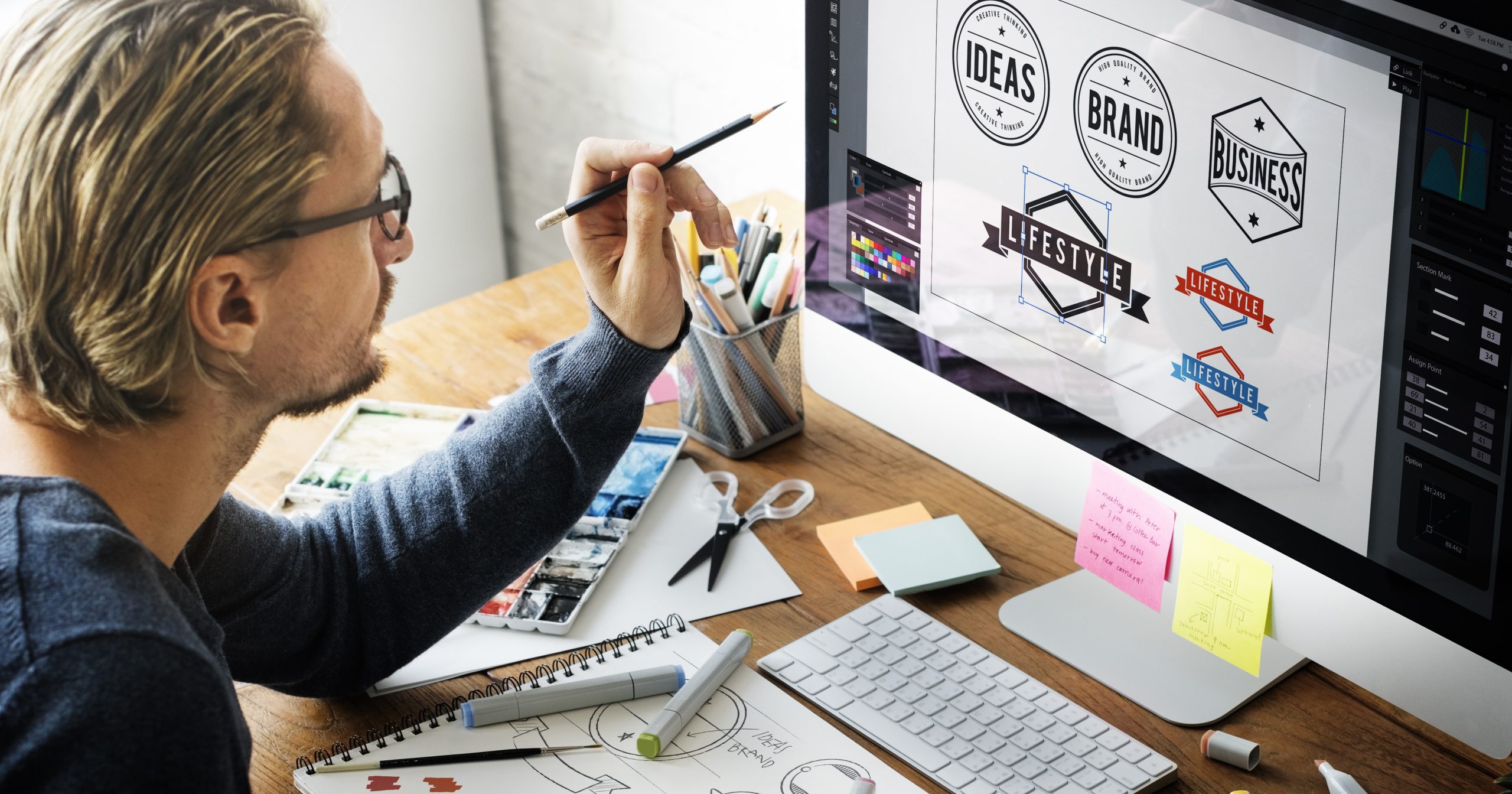 graphic designer creating brand design for client