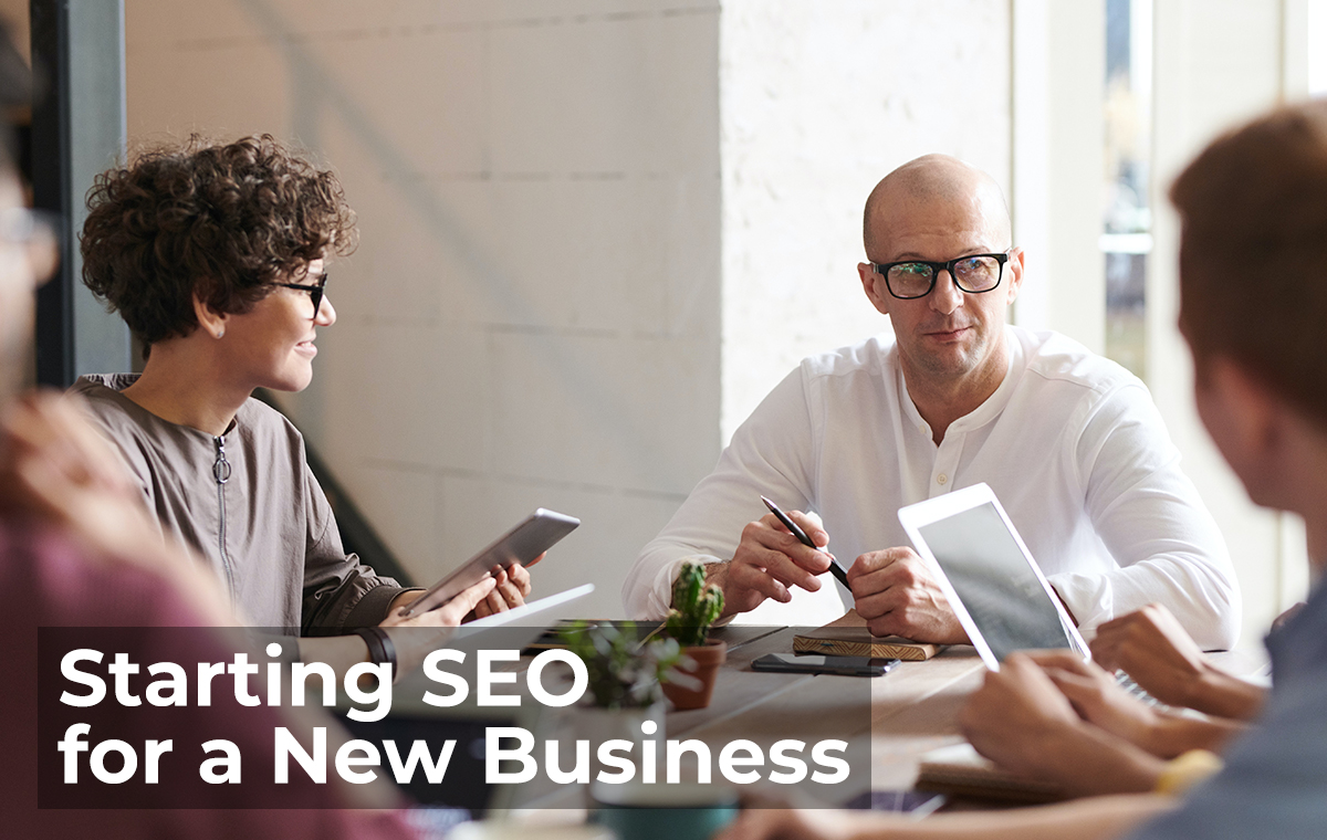start seo for a new business main header image for blog post team discussing tactics